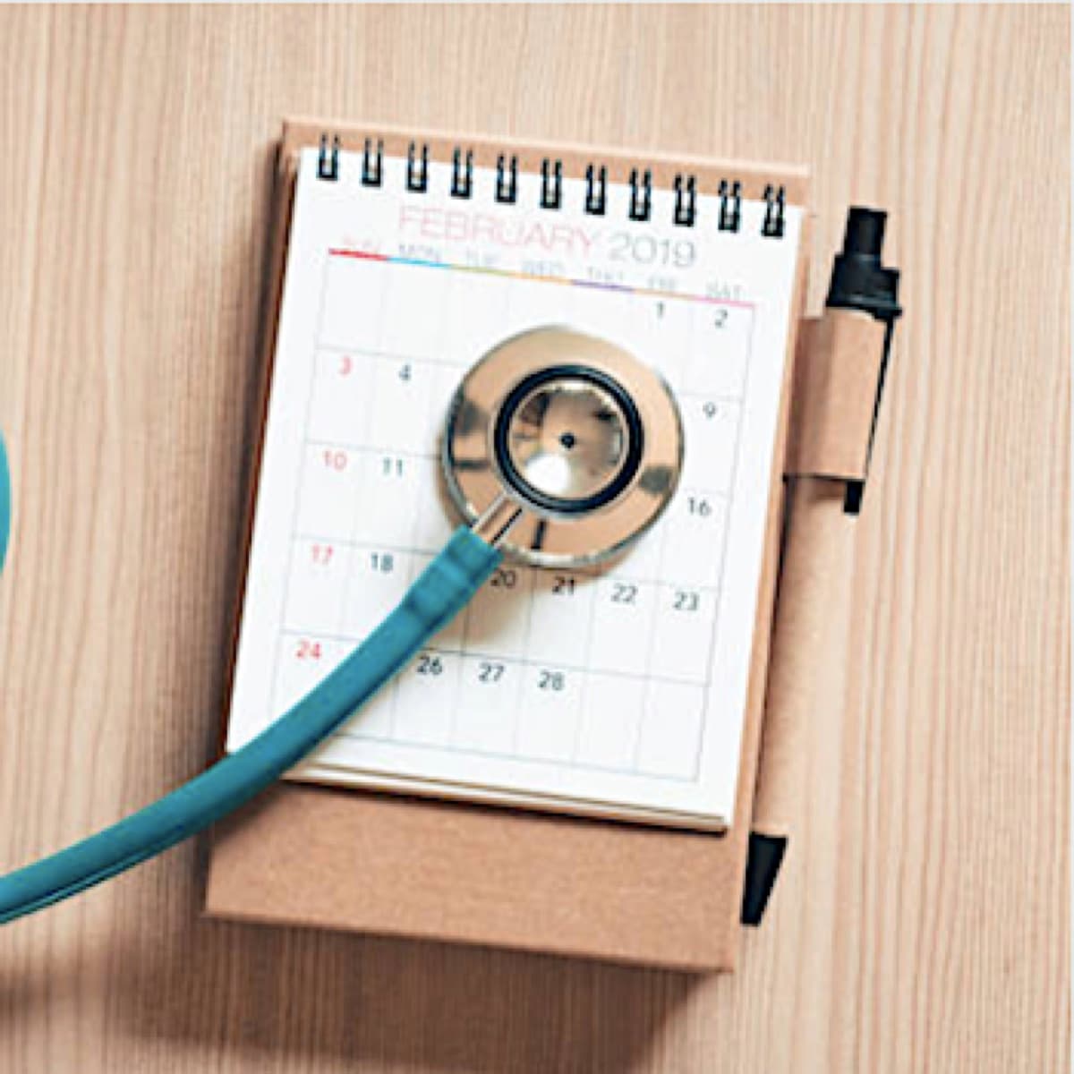 A desk calendar used for planning shifts